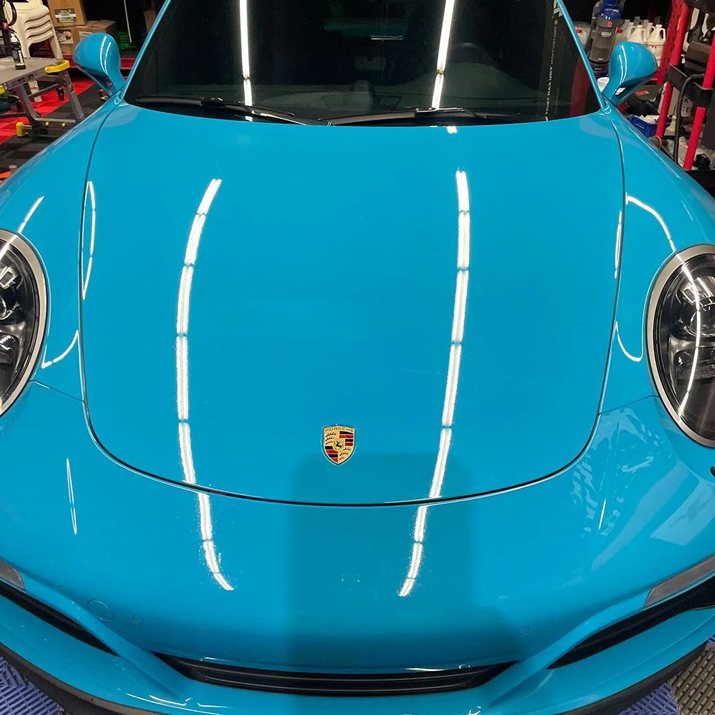 Corrected panel showing restored gloss and clarity